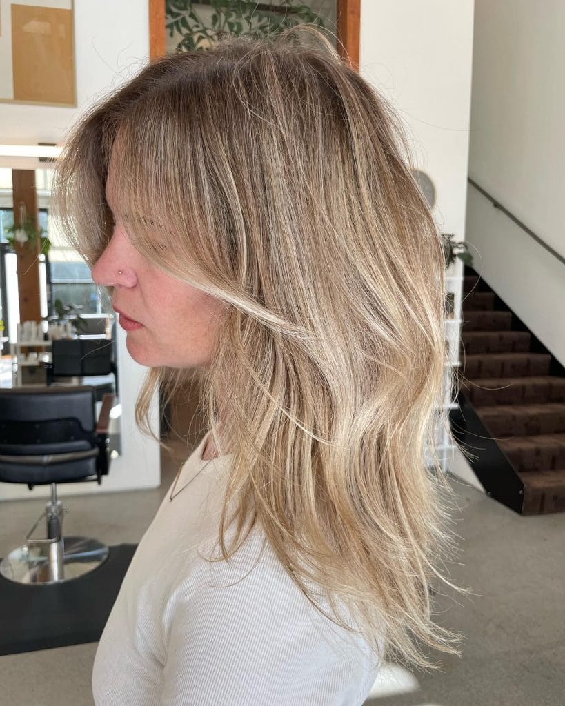 Woman with natural blonde hair in salon