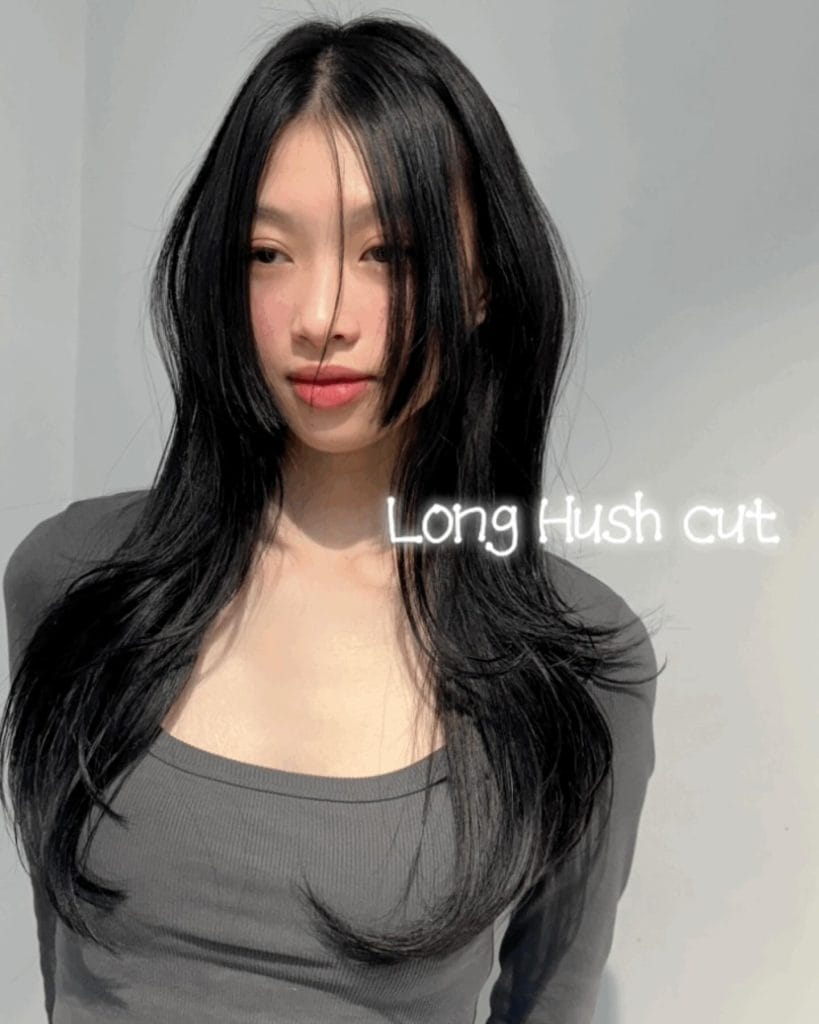 Woman with long hush cut hairstyle
