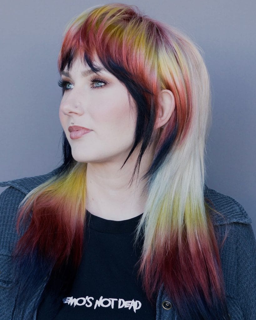 Person with vibrant rainbow hairstyle