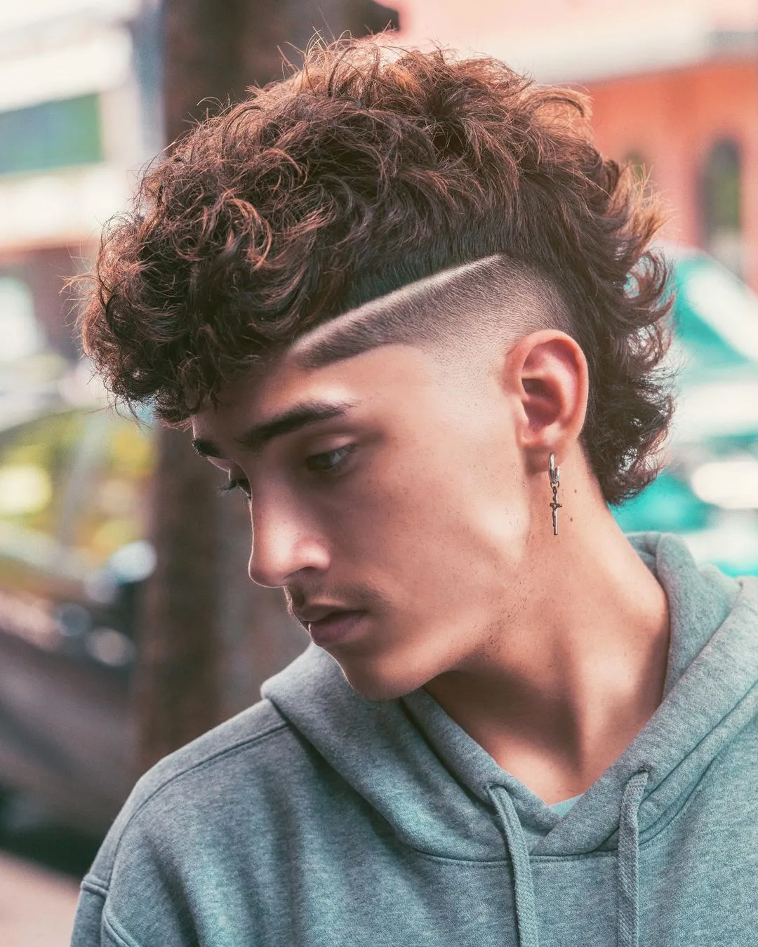 3 curly mohawk fade with shaved line
