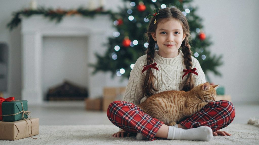 a little girl with cute christmas hairstyle