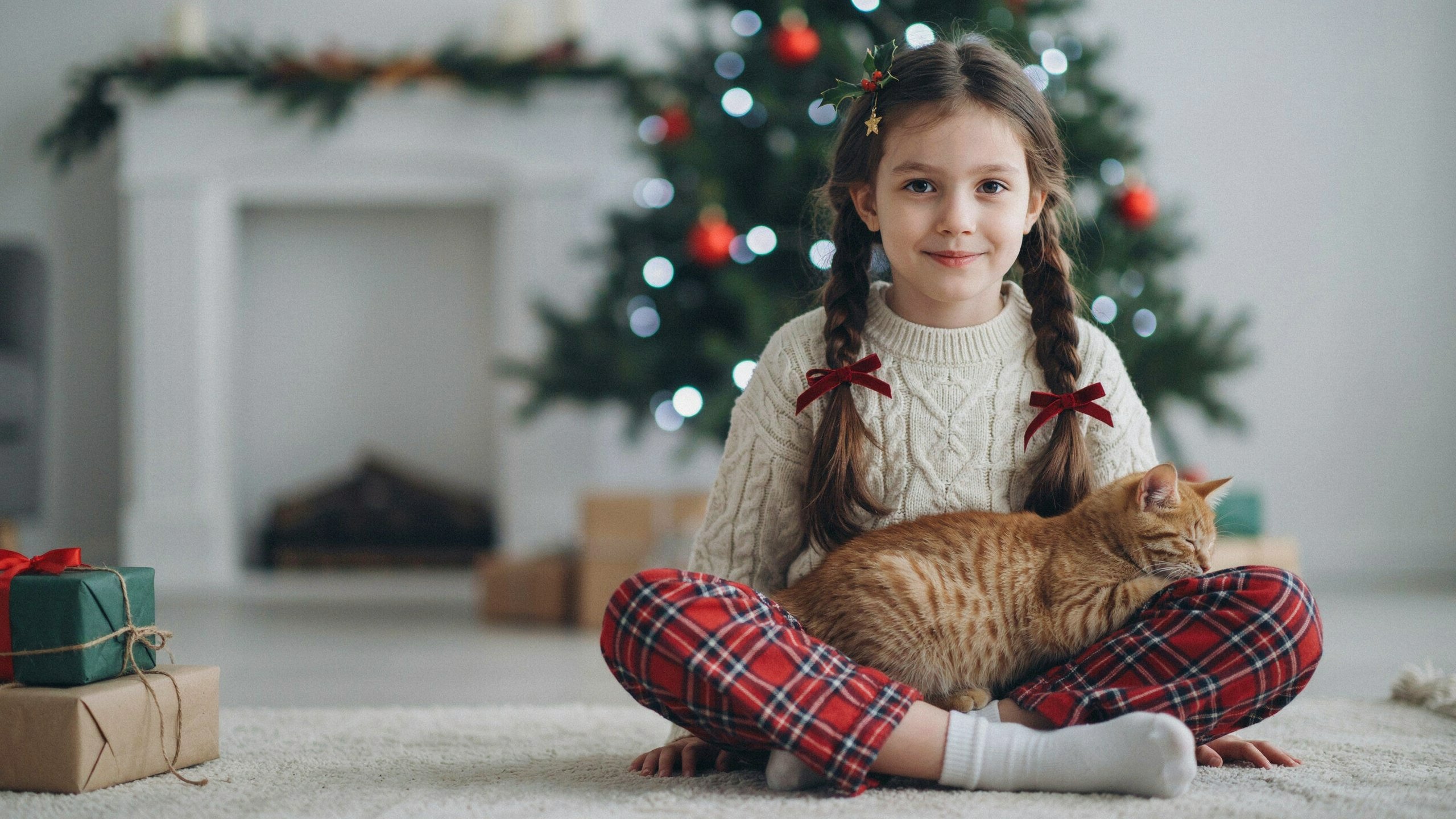 a little girl with cute christmas hairstyle